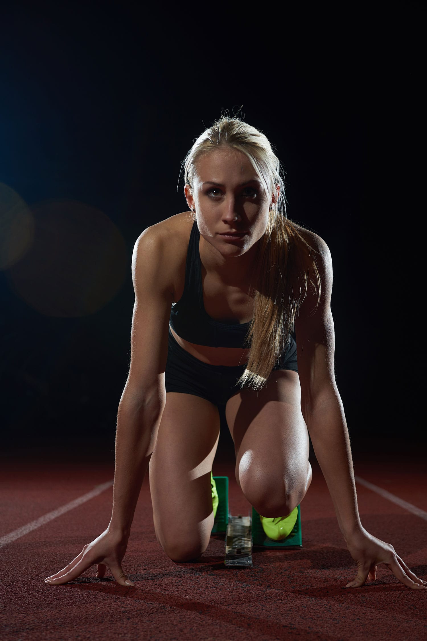 Imagem alternativa de uma atleta pronta para correr